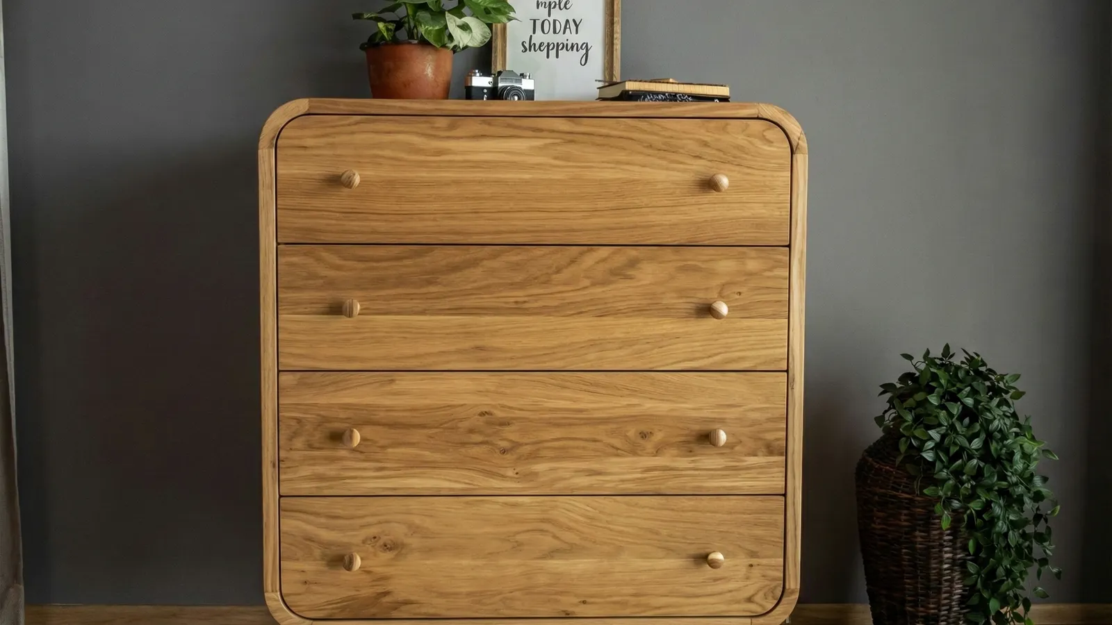 Small Removal Company crew carrying a chest of drawers on a single-item move